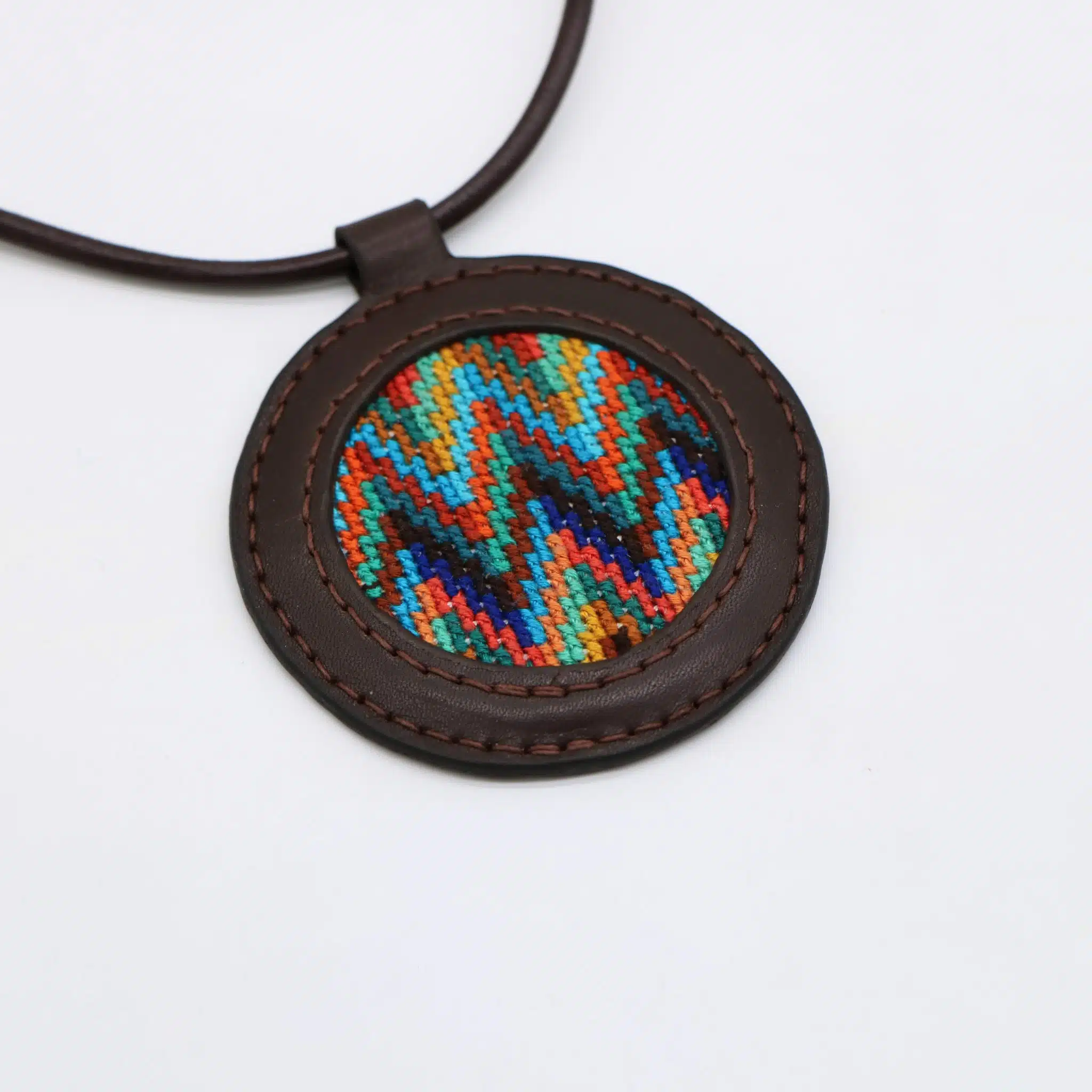 Genuine leather necklace with colorful Cross-stitching. 1 Genuine leather necklace with colorful Cross-stitching.