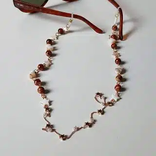 brownish seashell glasses chain