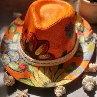 Orange hats with gold flowers