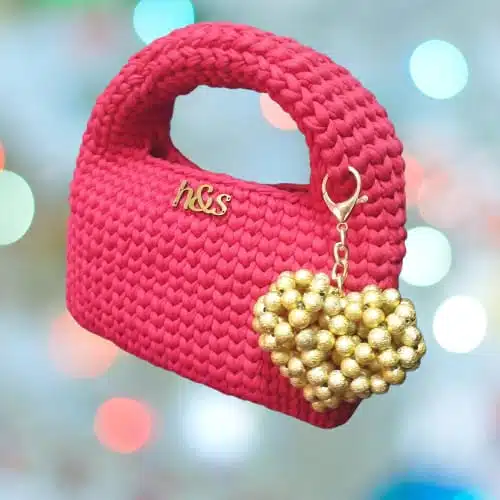 شنطة حمراء و قلب ذهبي 2 IMG 20250515 WA0057