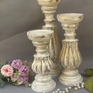 3 wooden candle holders with gold leaf