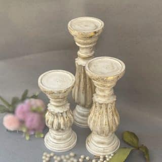 3 wooden candles with gold leaf