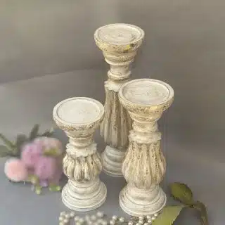 3 wooden candles with gold leaf
