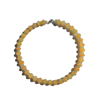 Citrine Skies Necklace A soft summer day, captured in stone.Inspired by the golden warmth of citrine sunsets and the tranquility of clear skies. Blends butter yellow and sky blue tones in a dreamy, refreshing palette. Handcrafted with natural jade gemstones and finished with 925 sterling silver clasp. Featuring: Material: Natural jade stones - Length: 42 cm - 925 sterling silver clasp