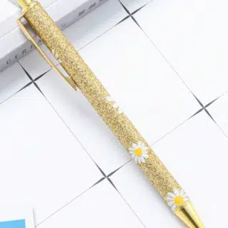flower decorated gold glitter pen