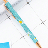 flower decorated blue glitter pen