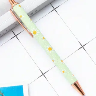 flower decorated light green glitter pen