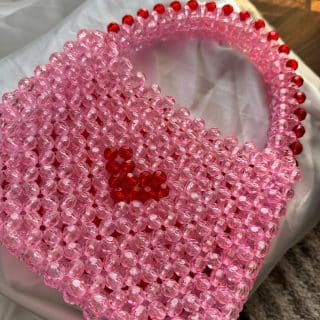 hear beaded bag , in red and pink
