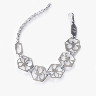 Sterling silver bracelet with flower motifs.