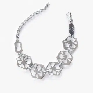 Sterling silver bracelet with flower motifs.