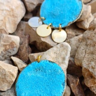 Bluerust circle earrings with brass charms