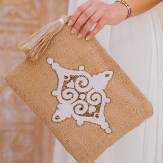 Embroidered appliqué clutch