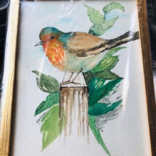 Bird resting on the Gate edge