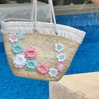 Flowers decorated palm leaves beach bag