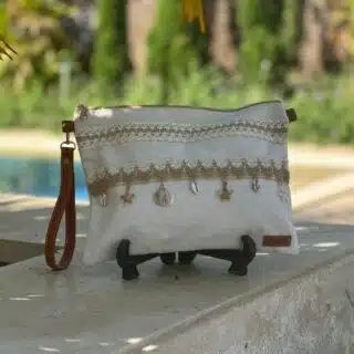 Off white clutch with sea life charms