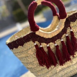 Burgundy tassels bag