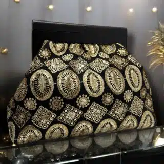 Midnight gold clutch