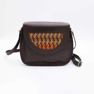 Dark brown genuine leather bag with colorful cross-stitching.
