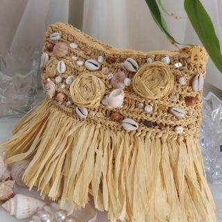 Raffia seashell clutch